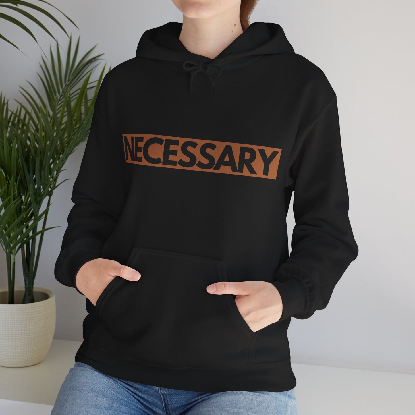 "necessary" Unisex Heavy Blend™ Hooded Sweatshirt